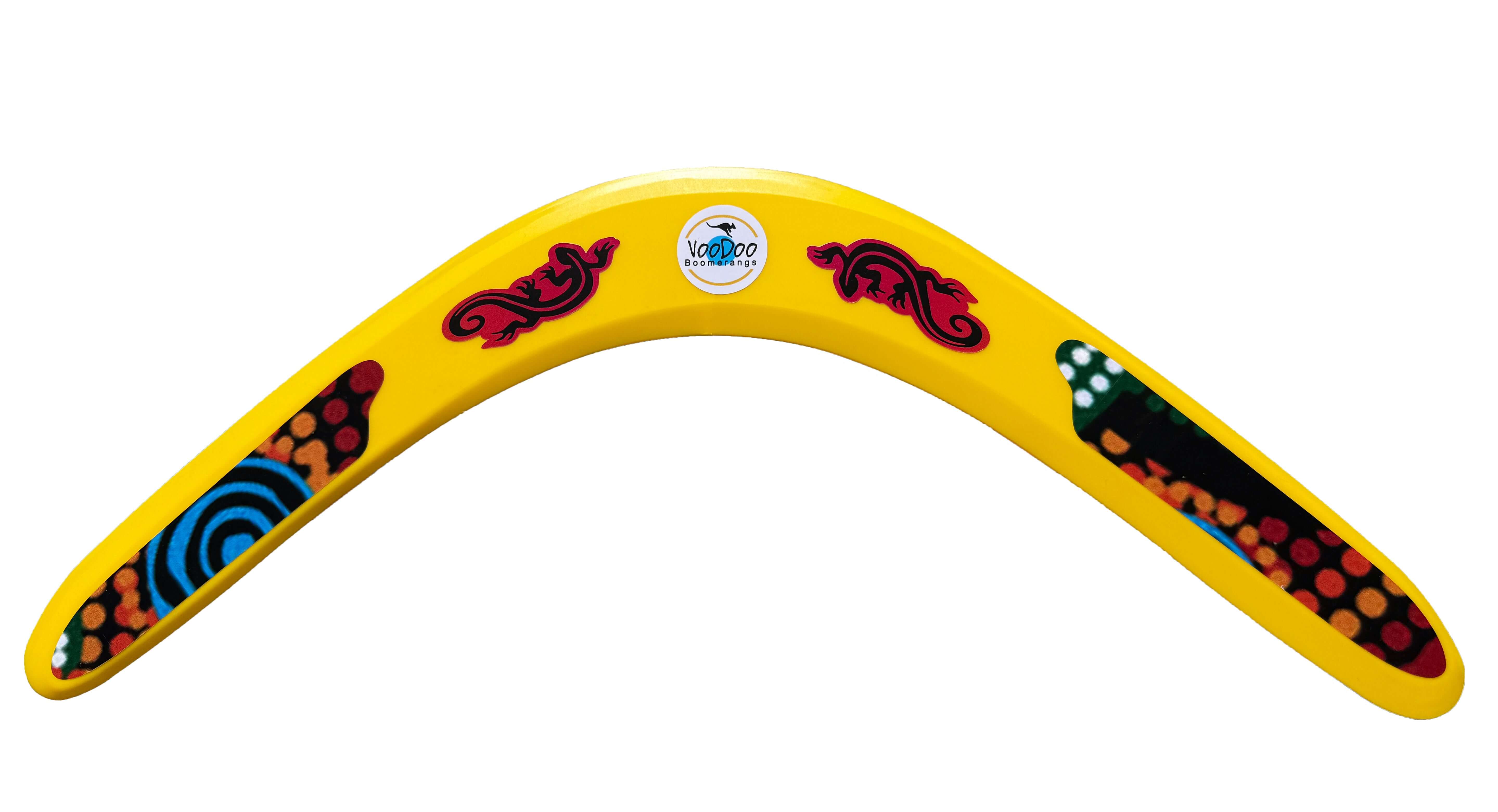 Plastic Aboriginal Boomerang by Voodoo, bright yellow with decorative patterns, perfect for beginner throwers and outdoor fun.